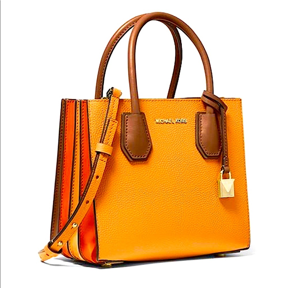 Authentic new Michael Kors pebbled leather purse.